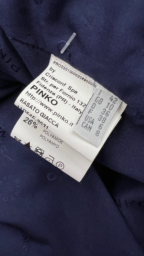 Bolero blu con cartellino