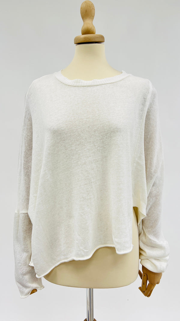 Maglia bianca asimmetrica