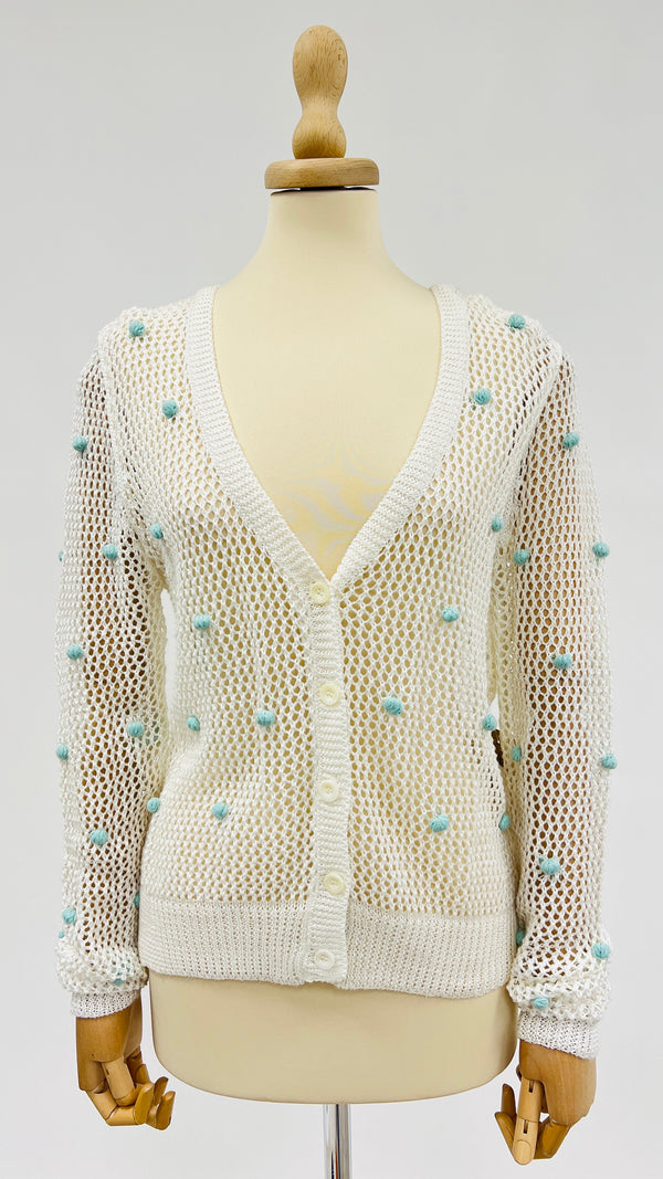 Cardigan a rete con pon-pon