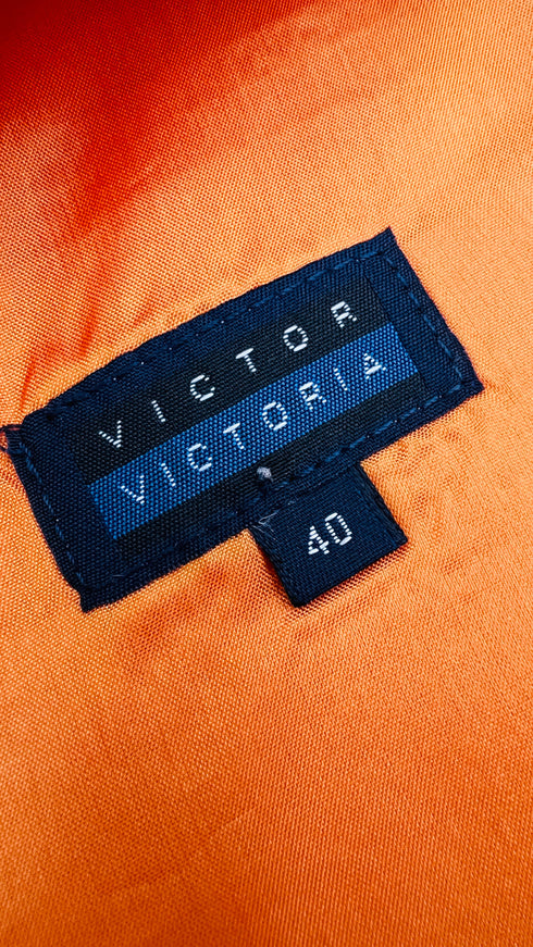 Top smanicato in seta