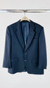 Blazer con bottone dorato