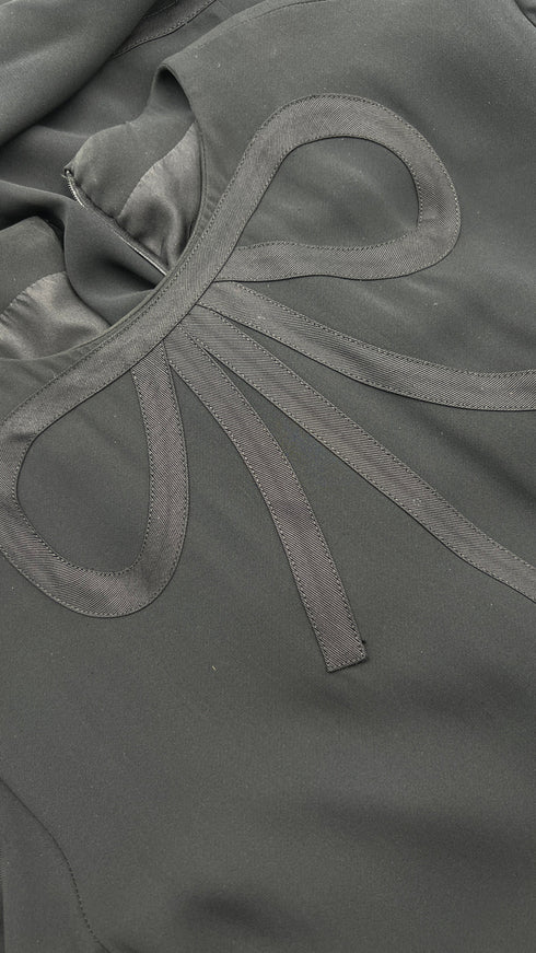 Abito lungo con fiocco