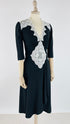 Abito midi con pizzo