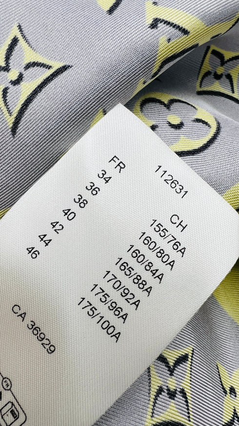 Completo in seta con cartellino