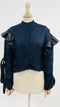 Camicia cropped con volant