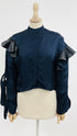 Camicia cropped con volant