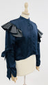 Camicia cropped con volant