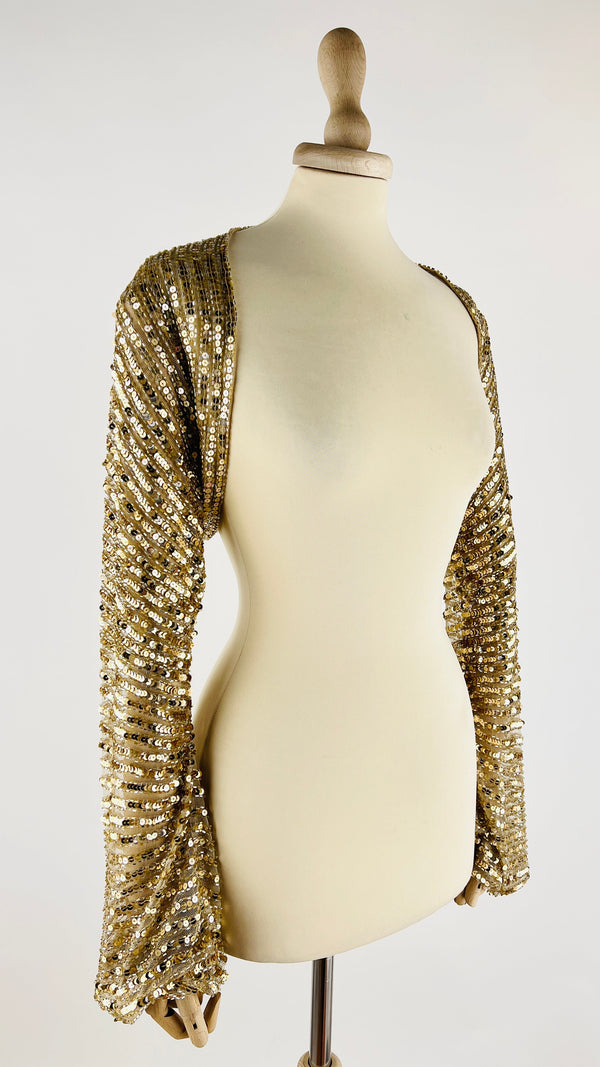 Coprispalle in paillettes dorate