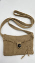Maglia distressed con tracolla