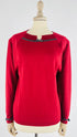Maglia girocollo fiocchi