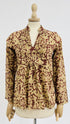 Blusa floreale astratta